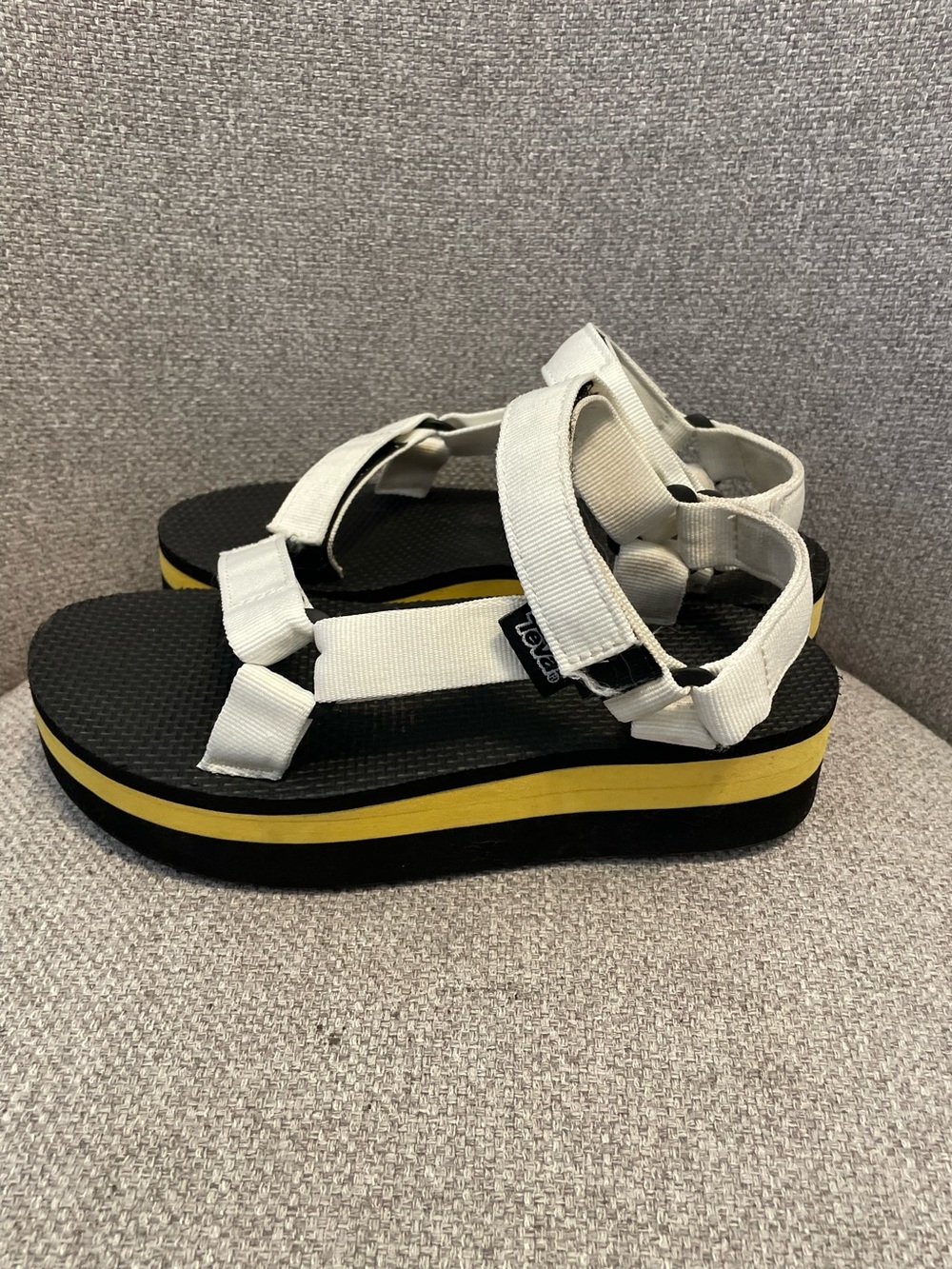 TEVA- Women's size 7 Flatform Universal in the White/Yellow/Black colorway.